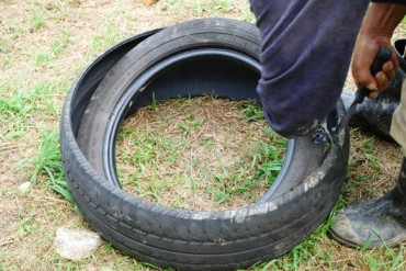 tire gardening,making concrete posts,making drainage holes in tires,uses for old tires