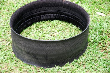 tire gardening,making concrete posts,making drainage holes in tires,uses for old tires